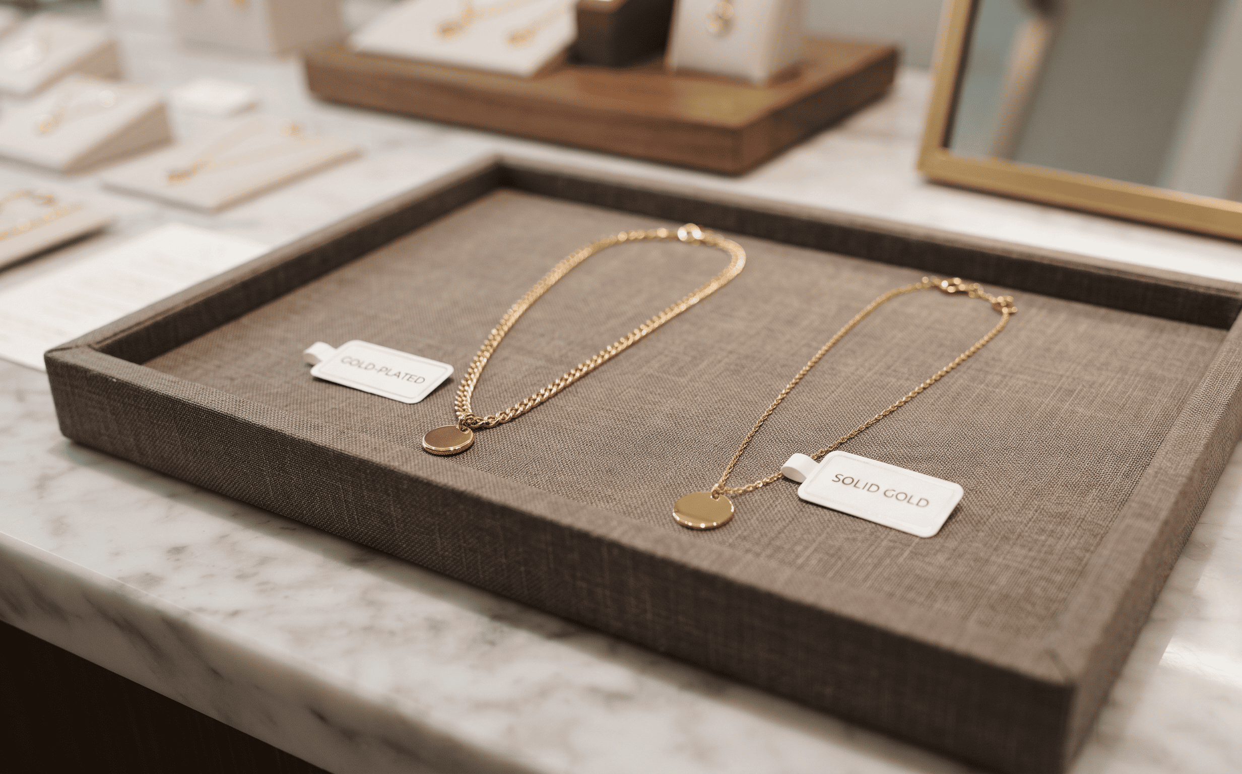 Gold-plated necklace and solid gold necklace comparison for bulk jewelry buyers